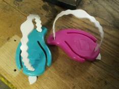 Injection moulded plastic scouring pad holders