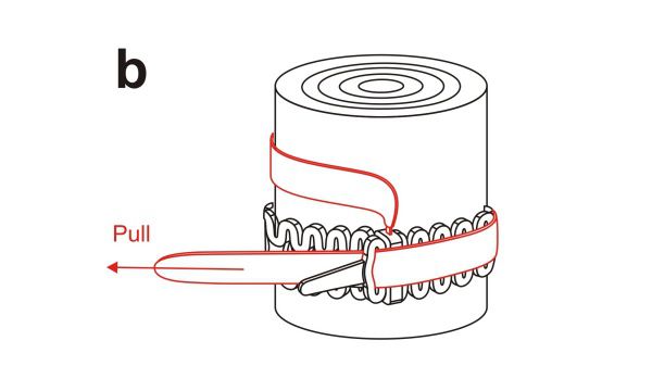 inserting locking strap through end cell inserting locking strap through end cell
